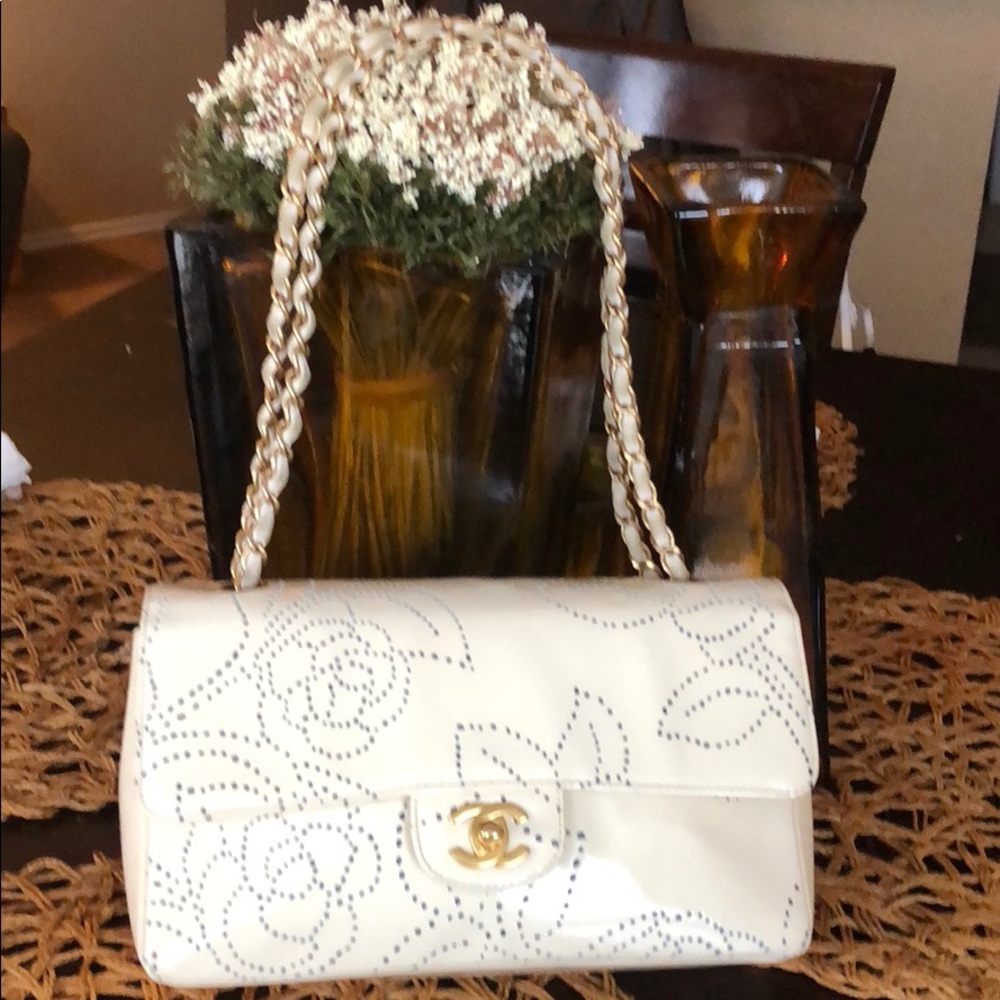 Authentic Chanel perforated camellia bag